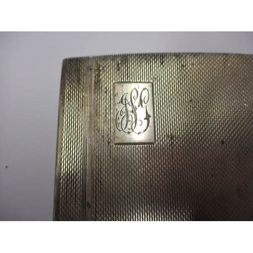 223 - A sterling silver cigarette case, approx. weight 141g in pre-owned condition with 1942 dated inscrip... 