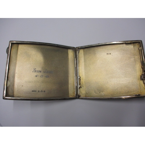 223 - A sterling silver cigarette case, approx. weight 141g in pre-owned condition with 1942 dated inscrip... 