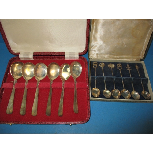 239 - Two boxed sets of white metal spoons, approx. gross parcel weight 179g in useable pre-owned conditio... 