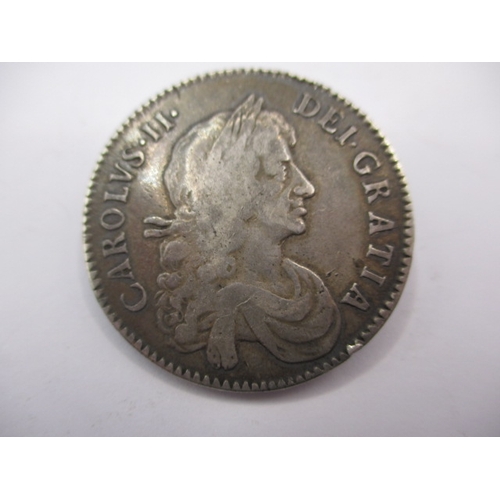 182 - A Charles II half crown dated 1671 and a sixpence dated 1681, both circulated coins with fine defini... 