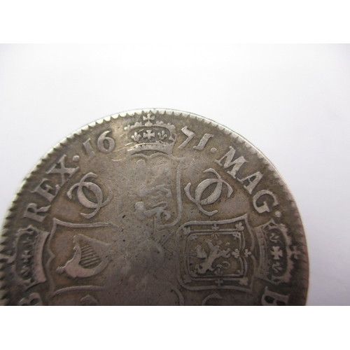 182 - A Charles II half crown dated 1671 and a sixpence dated 1681, both circulated coins with fine defini... 