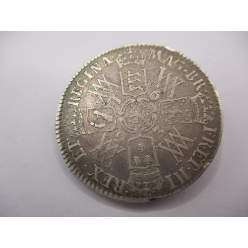 183 - Three William and Mary silver coins, to include a half crown dated 1693, a 4d dated 1690 (drilled) a... 