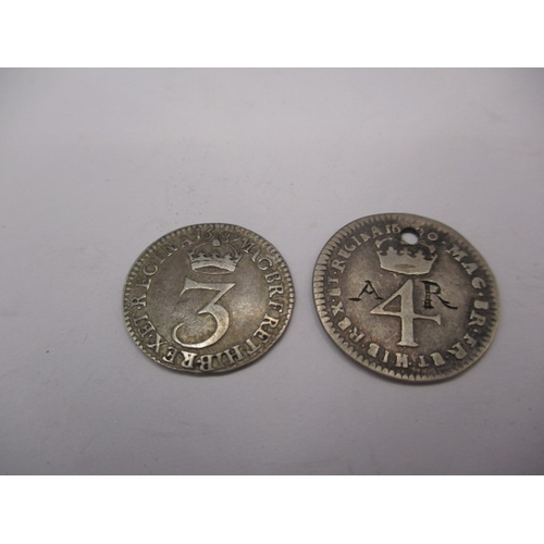 183 - Three William and Mary silver coins, to include a half crown dated 1693, a 4d dated 1690 (drilled) a... 