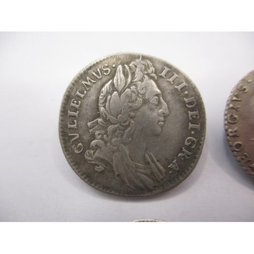 185 - 4 Antique silver coins, to include a William III sixpence dated 1696 a George III sixpence dated 178... 