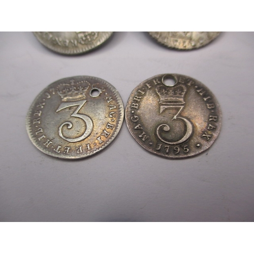 185 - 4 Antique silver coins, to include a William III sixpence dated 1696 a George III sixpence dated 178... 