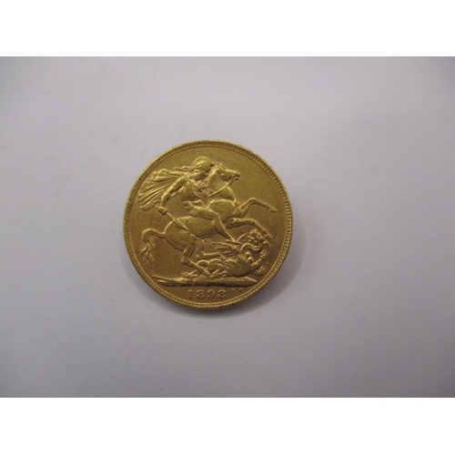 128 - A Victorian gold sovereign dated 1898, a circulated coin with fine definition of features