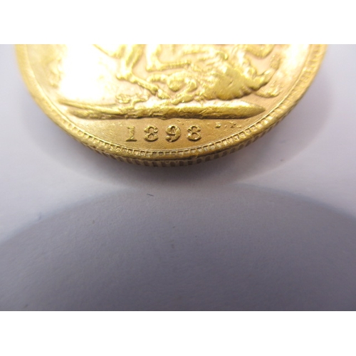 128 - A Victorian gold sovereign dated 1898, a circulated coin with fine definition of features