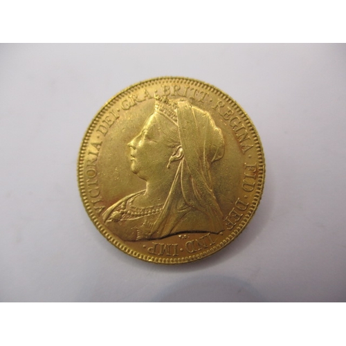 129 - A Victorian gold sovereign dated 1899, a circulated coin with fine definition of features