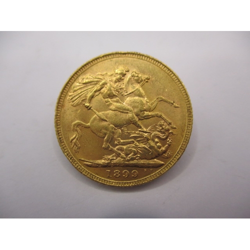 129 - A Victorian gold sovereign dated 1899, a circulated coin with fine definition of features