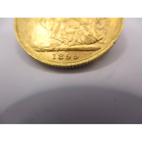 129 - A Victorian gold sovereign dated 1899, a circulated coin with fine definition of features