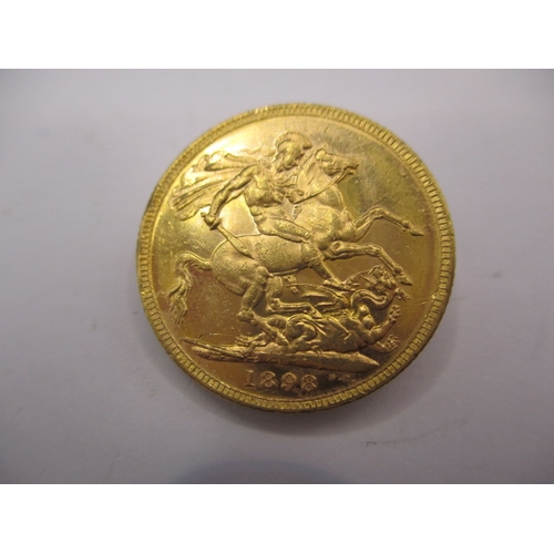 130 - A Victorian gold sovereign dated 1898, a circulated coin with fine definition of features