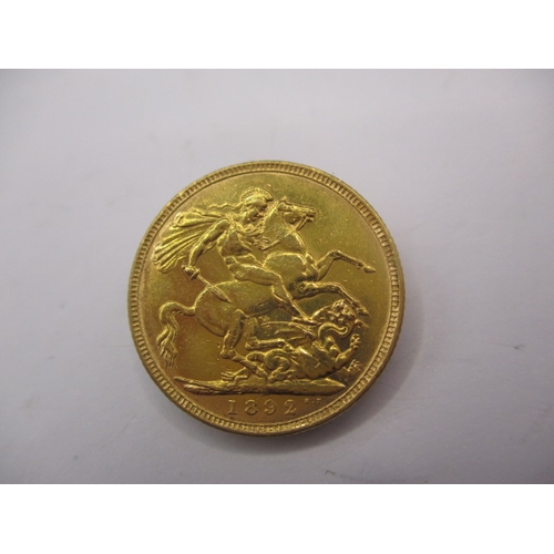 131 - A Victorian gold sovereign dated 1892, a circulated coin with fine definition of features