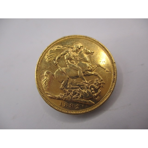 132 - A Victorian gold sovereign dated 1892, a circulated coin with fine definition of features