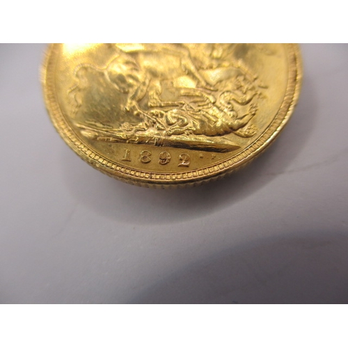 132 - A Victorian gold sovereign dated 1892, a circulated coin with fine definition of features