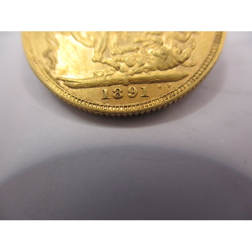 133 - A Victorian gold sovereign dated 1891, a circulated coin with fine definition of features