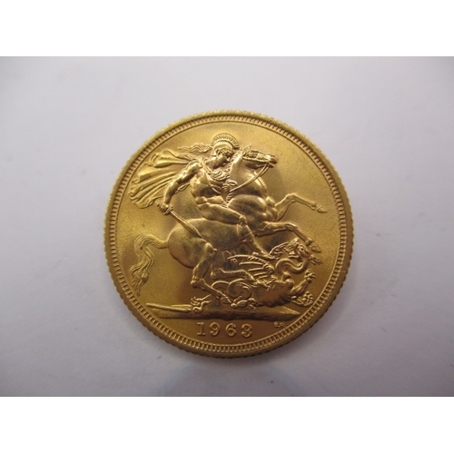 162 - A queen Elizabeth II gold sovereign dated 1963, a circulated coin with very fine definition of featu... 