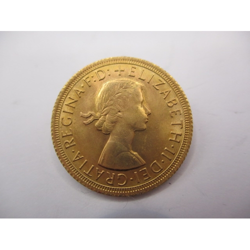 163 - A queen Elizabeth II gold sovereign dated 1968, a circulated coin with very fine definition of featu... 