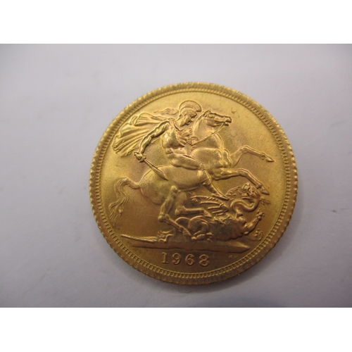 163 - A queen Elizabeth II gold sovereign dated 1968, a circulated coin with very fine definition of featu... 