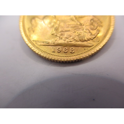 163 - A queen Elizabeth II gold sovereign dated 1968, a circulated coin with very fine definition of featu... 