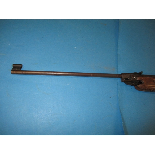 279 - A vintage Weihrauch HW35 break barrel air rifle, 5.5mm calibre, in pre-owned working order with use-... 