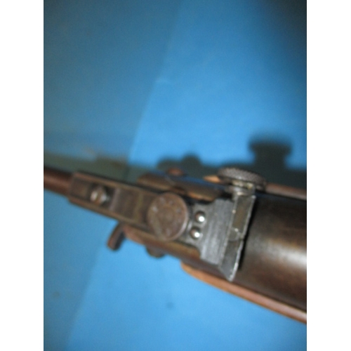 279 - A vintage Weihrauch HW35 break barrel air rifle, 5.5mm calibre, in pre-owned working order with use-... 