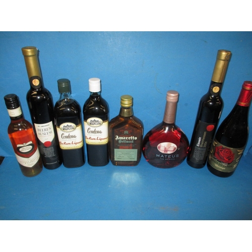 353 - A mixed selection of wines and liqueurs, all un-opened