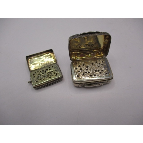 231 - Two antique sterling silver vinaigrettes, both with original perforated grills, in good pre-owned co... 