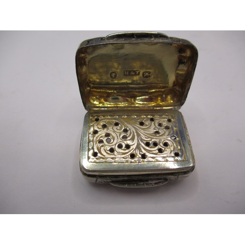 231 - Two antique sterling silver vinaigrettes, both with original perforated grills, in good pre-owned co... 