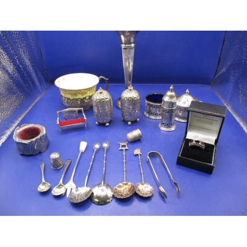 240 - A parcel of silver and white metal fancies, to include cruets cup holder and a ring, all in good pre... 