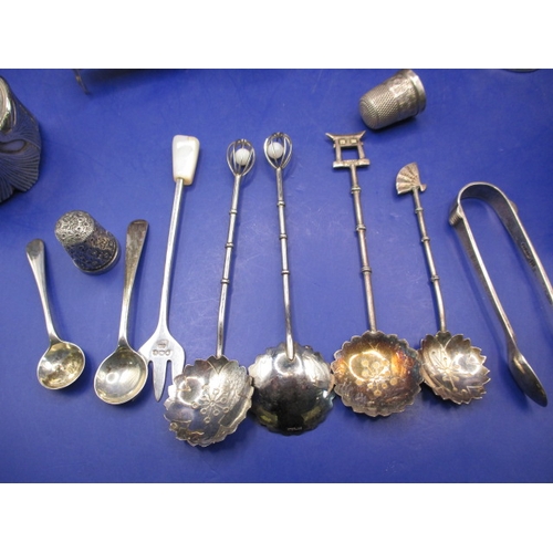 240 - A parcel of silver and white metal fancies, to include cruets cup holder and a ring, all in good pre... 