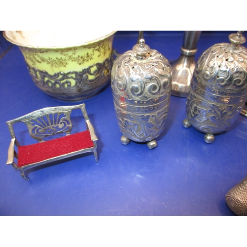 240 - A parcel of silver and white metal fancies, to include cruets cup holder and a ring, all in good pre... 