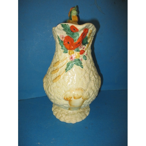 262 - A Clarice Cliff Celtic Harvest pattern jug, approx. height 23cm in good pre-owned condition