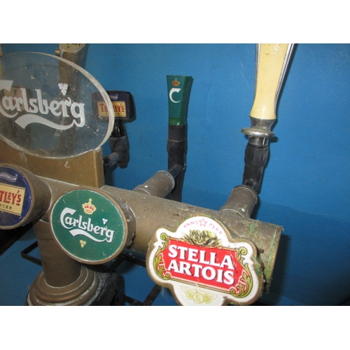 330 - A vintage 5 tap beer pump, being a professional bar model with brass body, in used condition