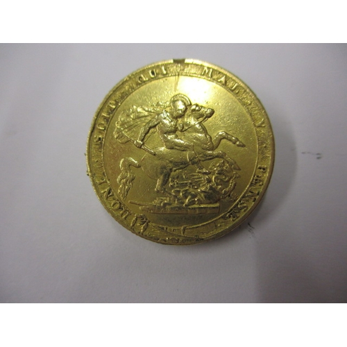 146 - A George III gold sovereign dated 1820, a circulated coin with fine definition of features with mark... 