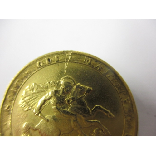 146 - A George III gold sovereign dated 1820, a circulated coin with fine definition of features with mark... 