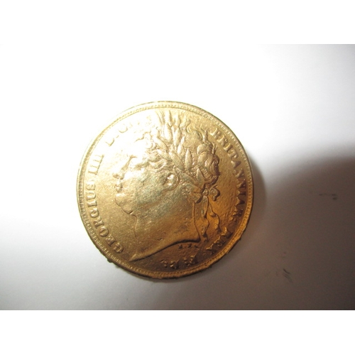 147 - A George IIII gold sovereign dated 1821, a circulated coin with fine definition of features with mar... 