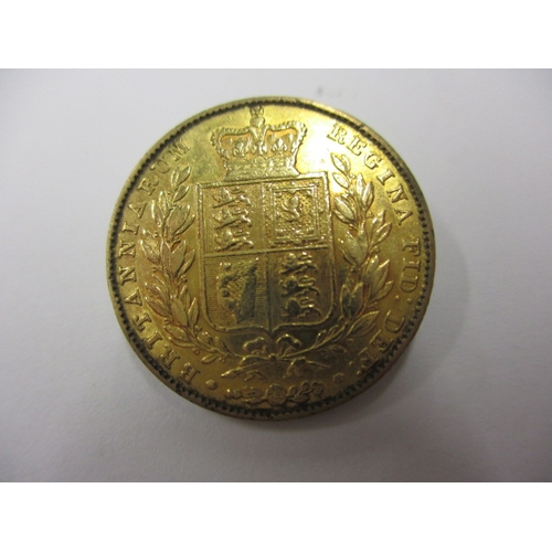 148 - A Victorian gold sovereign dated 1847, a circulated coin with fine definition of features, having th... 