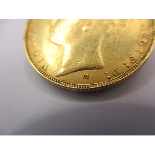 149 - A Victorian gold sovereign dated 1885, a circulated coin with fine definition of features, having ra... 