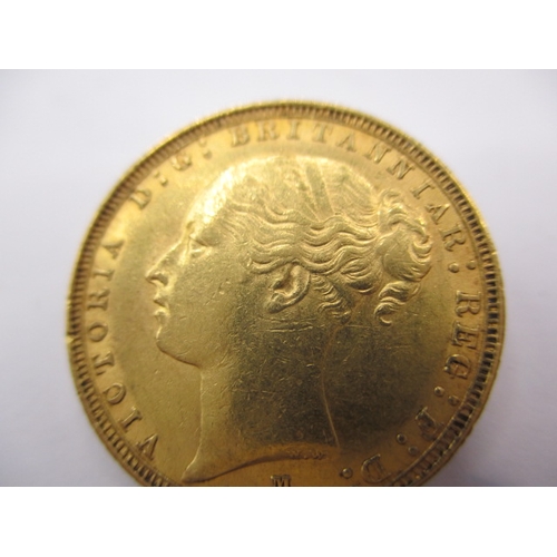 149 - A Victorian gold sovereign dated 1885, a circulated coin with fine definition of features, having ra... 