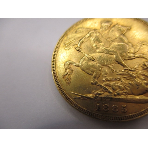 149 - A Victorian gold sovereign dated 1885, a circulated coin with fine definition of features, having ra... 