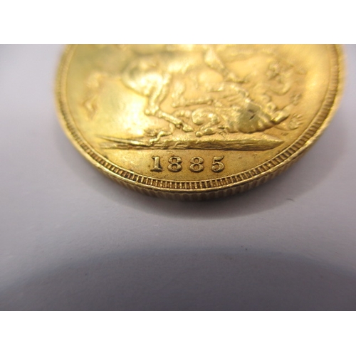 149 - A Victorian gold sovereign dated 1885, a circulated coin with fine definition of features, having ra... 