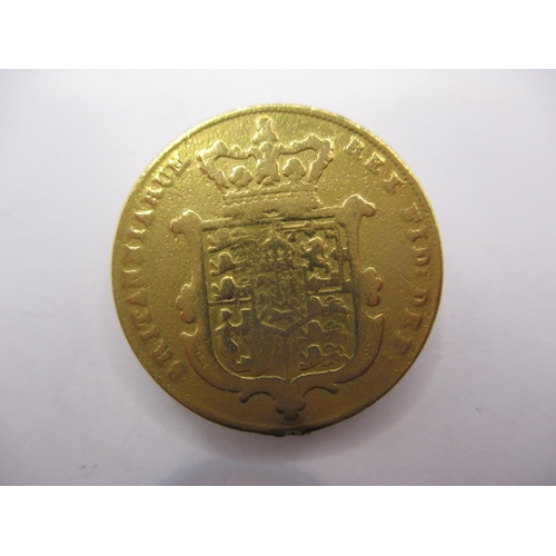 152 - A George IV gold sovereign dated 1825, a circulated coin with fine definition of features, having ma... 