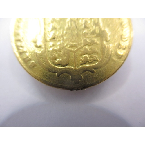 152 - A George IV gold sovereign dated 1825, a circulated coin with fine definition of features, having ma... 