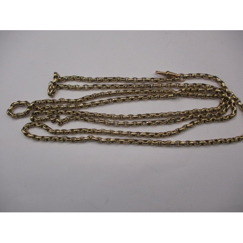 69 - An unmarked yellow gold guard/muff chain, approx. linear length 144cm, approx. weight 55.3g, in usea... 