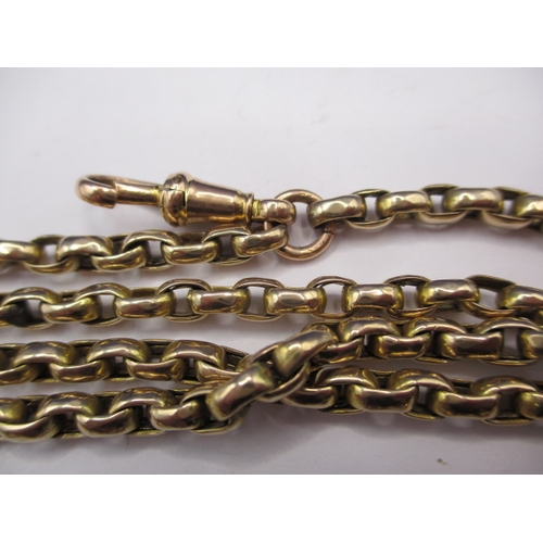 69 - An unmarked yellow gold guard/muff chain, approx. linear length 144cm, approx. weight 55.3g, in usea... 