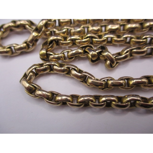 69 - An unmarked yellow gold guard/muff chain, approx. linear length 144cm, approx. weight 55.3g, in usea... 