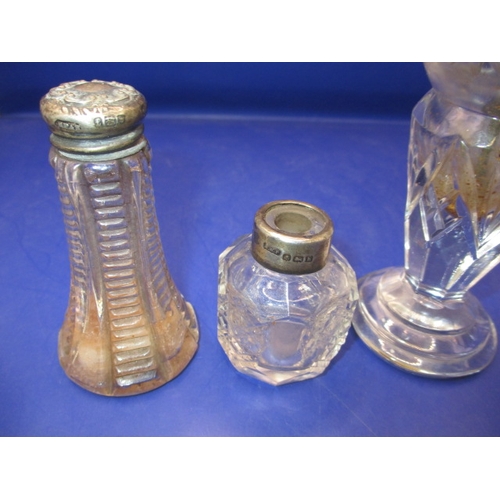 243 - A parcel of vintage scent and other bottles with silver and white metal mounts, all in used conditio... 