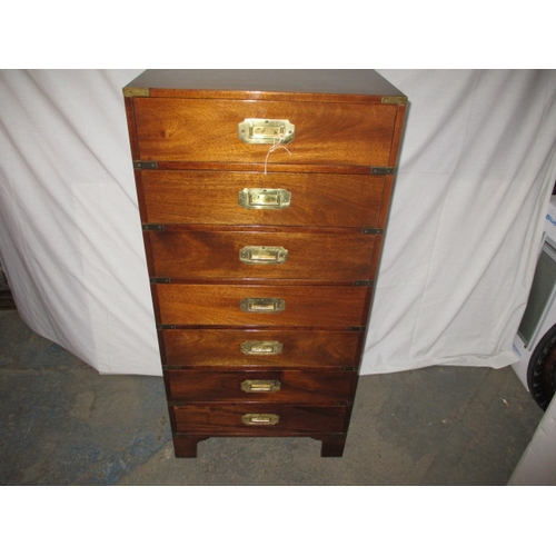 318 - A campaign style chest of drawers, having 7 drawers and brass corner counts, approx. size H 115cm W ... 