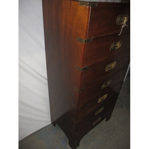 318 - A campaign style chest of drawers, having 7 drawers and brass corner counts, approx. size H 115cm W ... 