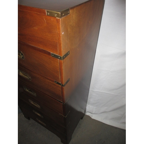 318 - A campaign style chest of drawers, having 7 drawers and brass corner counts, approx. size H 115cm W ... 